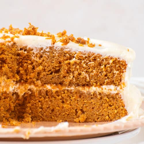 Moist one bowl carrot cake with cream cheese frosting showing soft carrot cake layers and tender crumb