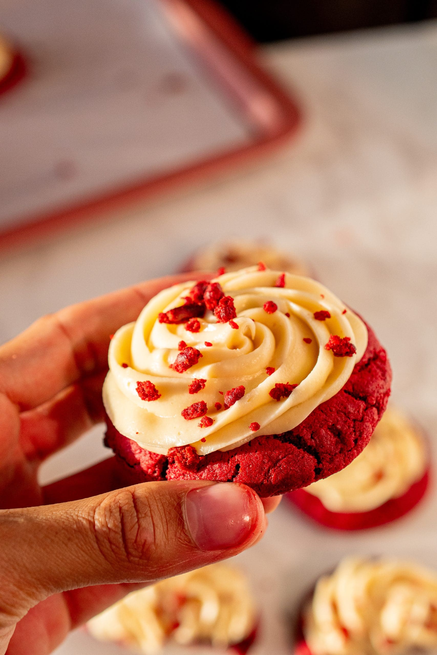 Butter and cream cheese being mixed together to create a smooth and creamy frosting.
