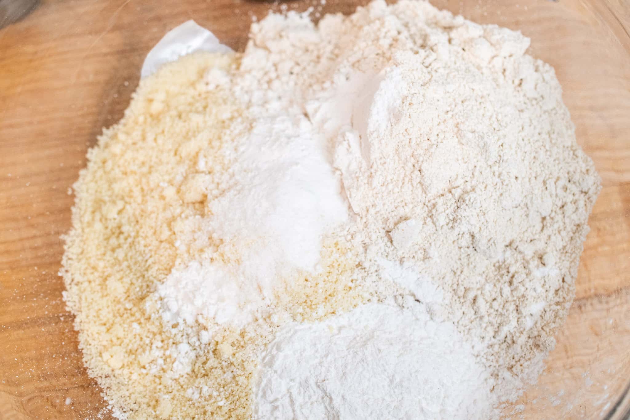 Measuring out the gluten free dry ingredients together.