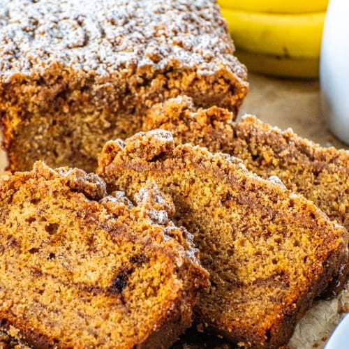 Moist coffee cake banana bread slices with cinnamon swirl and streusel crumb topping