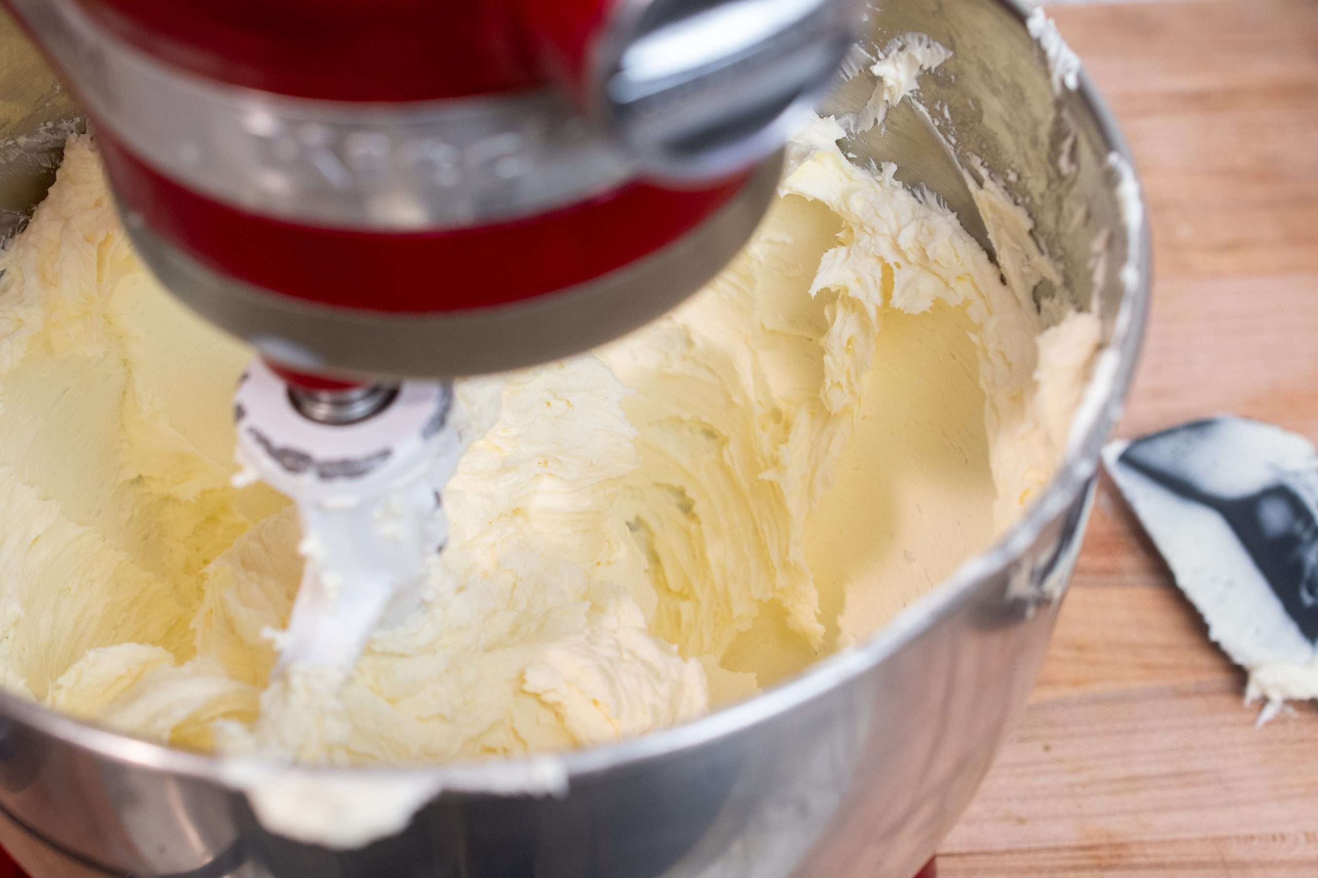 Mixing cream cheese and mascarpone in a stand mixer.