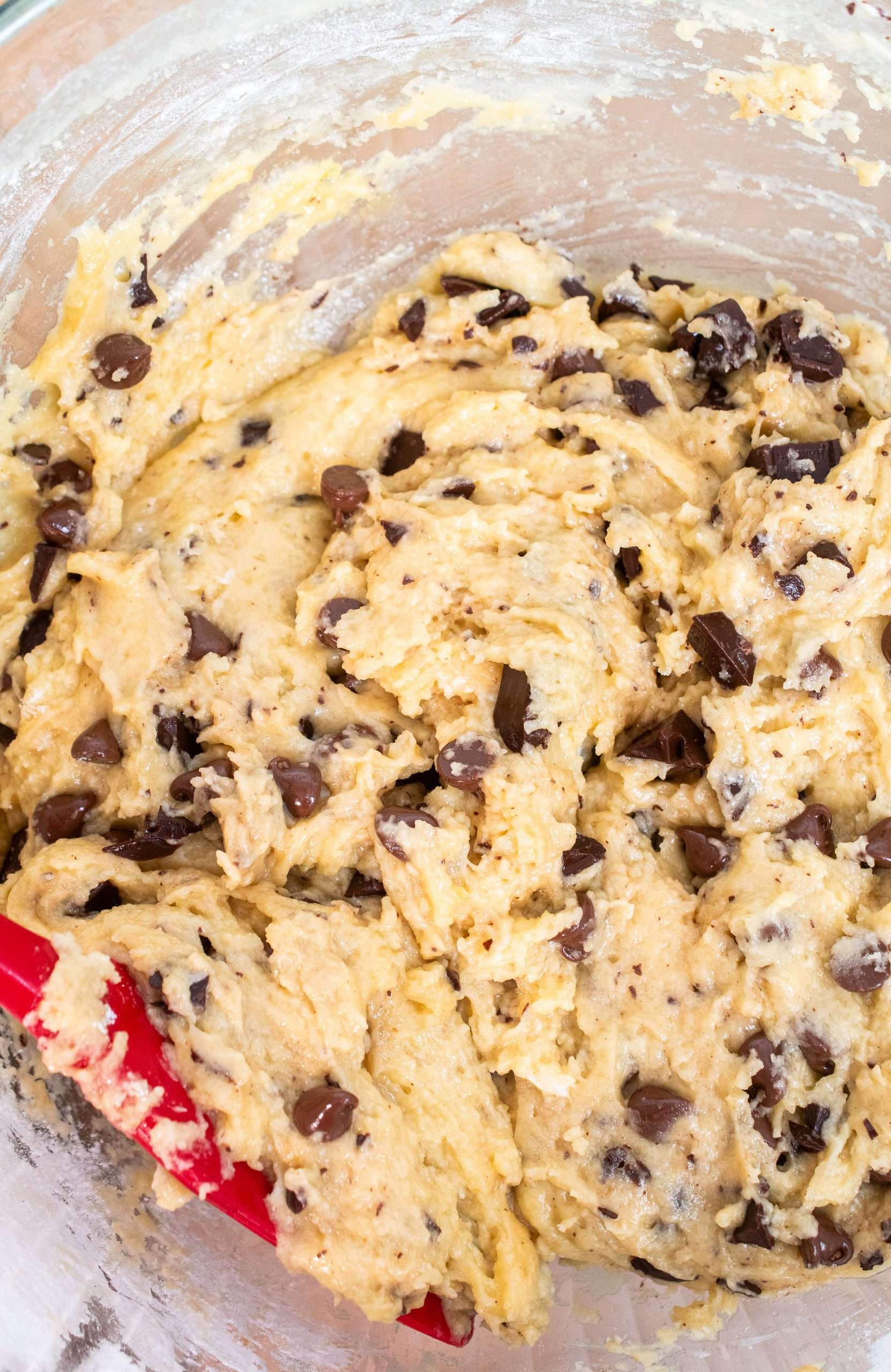 Thick muffin batter with chopped chocolate and chocolate chips mixed in.