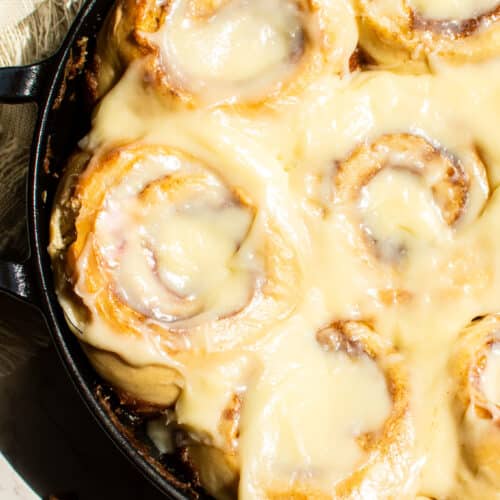 Gooey cinnamon rolls in cast iron skillet - soft, fluffy homemade recipe