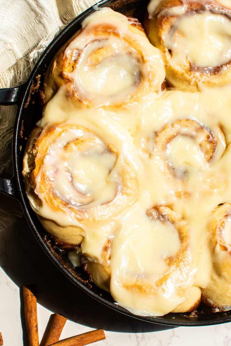 Gooey cinnamon rolls in cast iron skillet - soft, fluffy homemade recipe