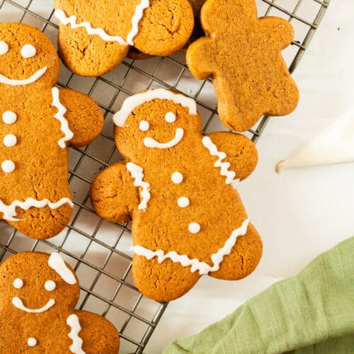 Soft cut out gingerbread cookies decorated with simple white icing