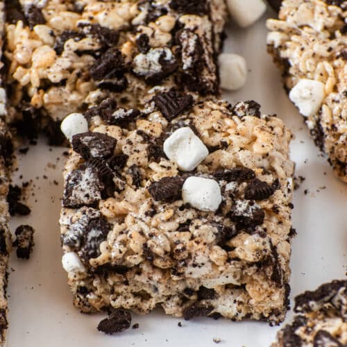 Gooey Oreo Rice Krispie Treats topped with chopped Oreos and mini marshmallows