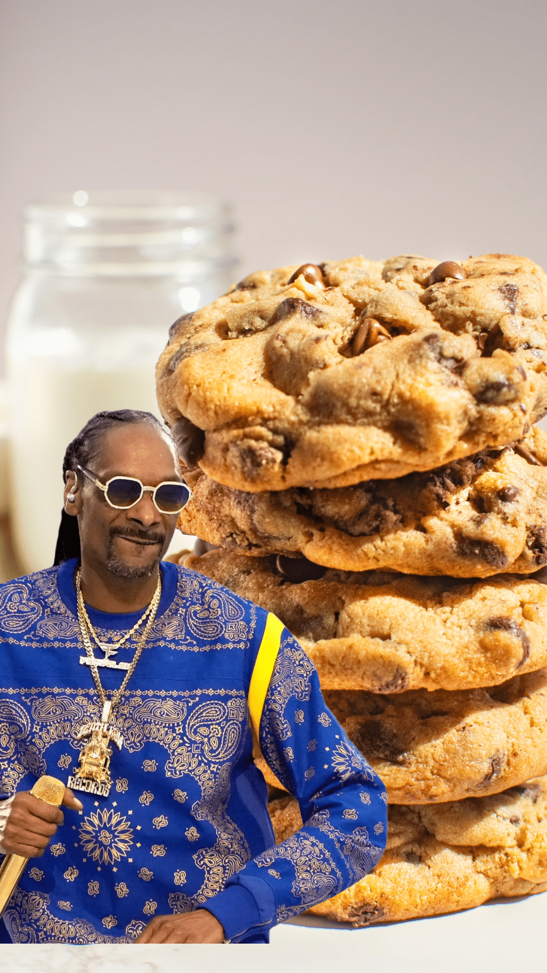 Snoop Dogg with stacked peanut butter chocolate chip cookies from his Rolls Royce cookie recipe